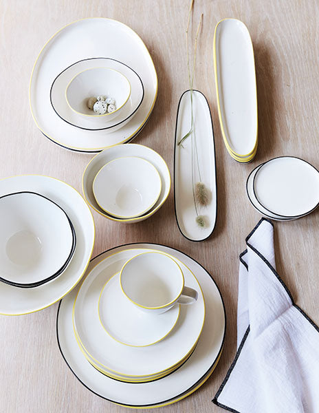 Abbesses Grey Rim Porcelain Small Serving Platter Canvas Home Abbesses, Abbesses Collection, Abbesses Grey Rim, Abbesses Platter, Abbesses Serving Platter, Colored Rim, Grey, Grey Rim, Platter, Porcelain, Serving, Serving Platter, Serving Trays + Platters, White, White & Grey