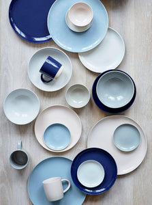 Blue, Indigo, White, and Soft pink mugs, small bowls, plates, and cereal bowls