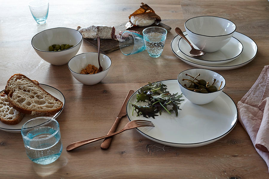 Abbesses Black Rim Porcelain Small Bowl - Set of 4 Canvas Home Abbesses, Abbesses Black Rim, Abbesses Bowl, Abbesses Collection, Appetizer Bowl, Black, Black Rim, Bowls, Colored Rim, Dessert Bowl, Dip Bowl, Porcelain, Porcelain Dinnerware, Prep Bowl, Rice Bowl, White, White & Black